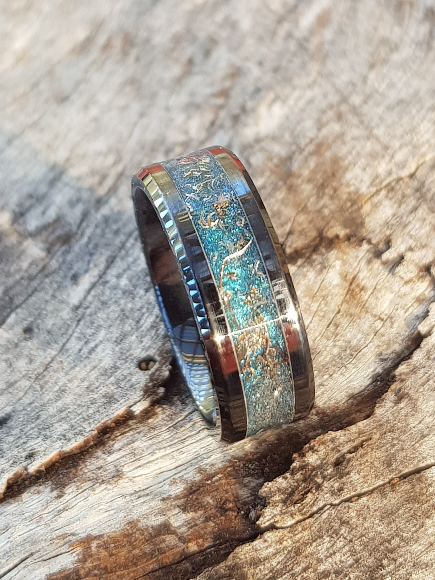 Handmade Meteorite black ceramic ring. Set with genuine meteorite dust