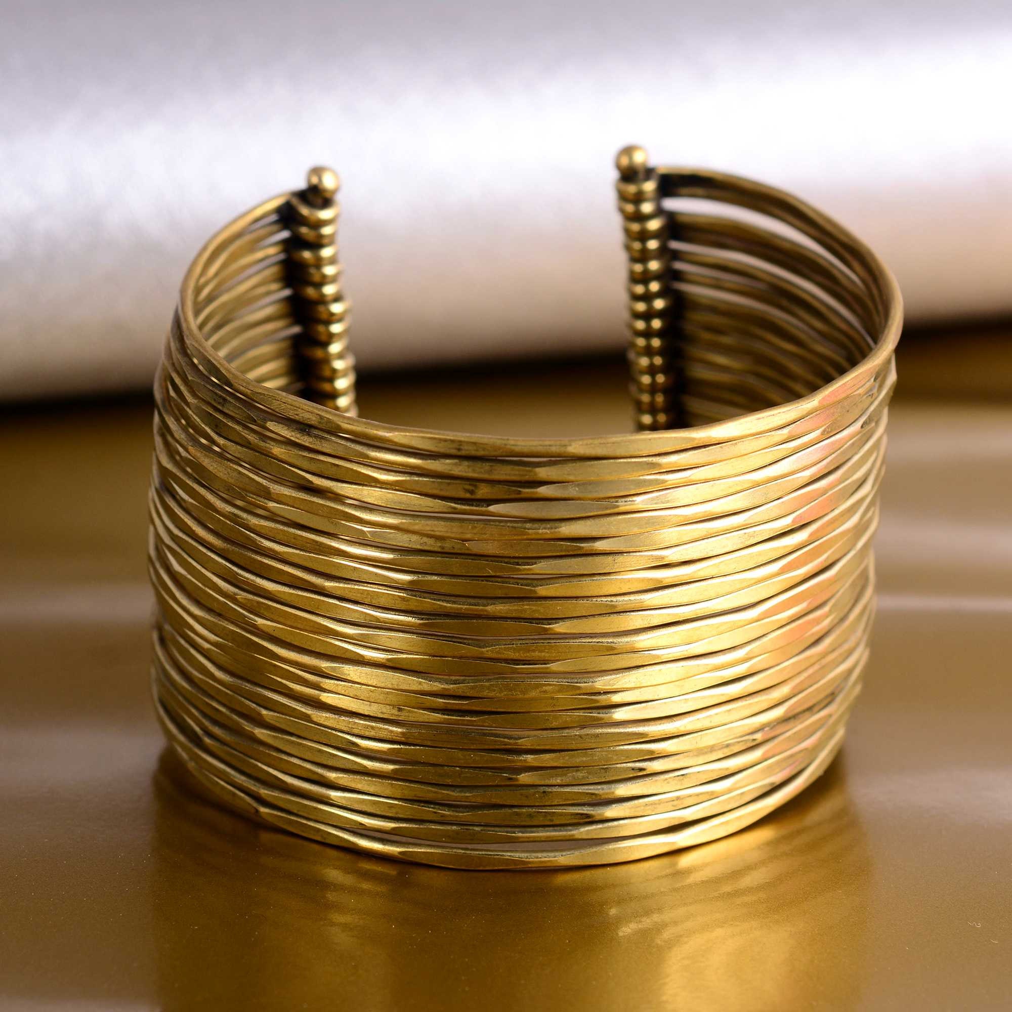 Broad gold bracelet designs deals