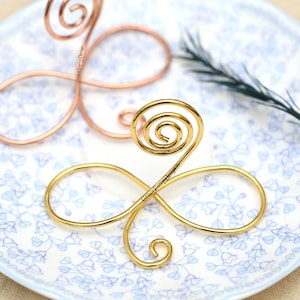 Wire infinity Bow table number holders, Gold wedding name place card holders, Custom Engraved Stainless Steel Holders, wedding table decor