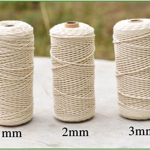 May include: Three spools of natural cotton cord, each with a different thickness: 1 mm, 2 mm, and 3 mm.