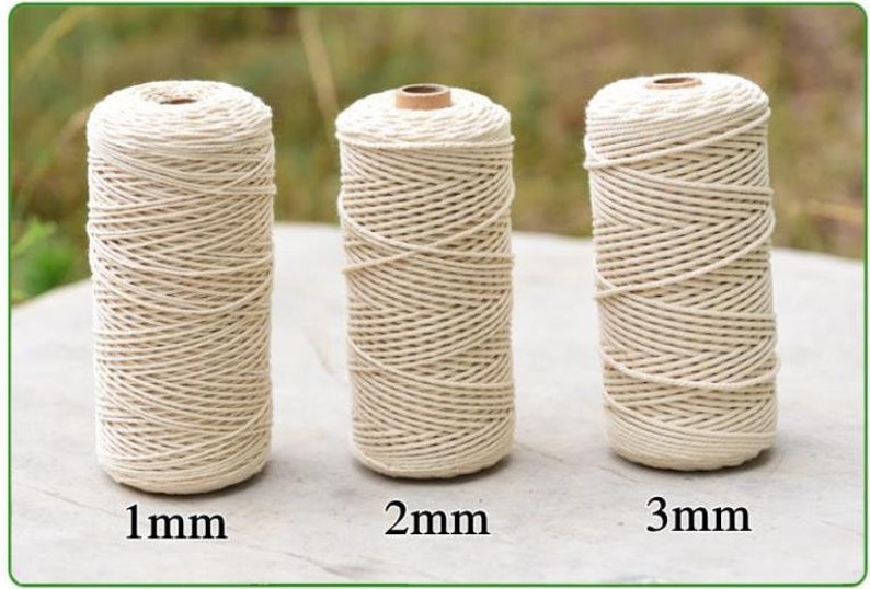 May include: Three spools of natural cotton cord, each with a different thickness: 1 mm, 2 mm, and 3 mm.