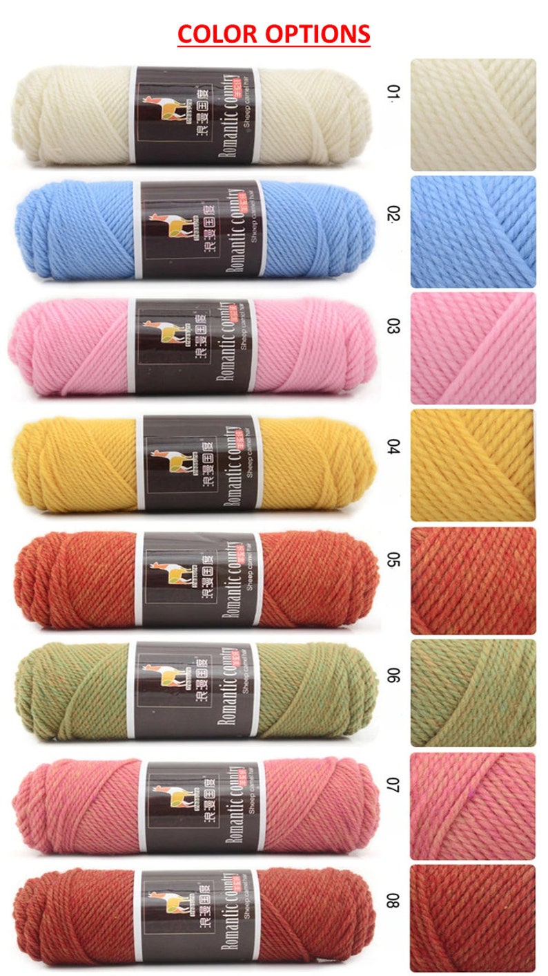 May include: A selection of yarn skeins in various colors, including white, light blue, pink, yellow, orange, green, and red. The yarn is labeled "Romantic Country" and features a llama logo.