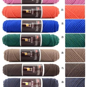 May include: A selection of ten yarn skeins in various colors, including light blue, pink, orange, blue, green, brown, dark brown, navy blue, purple, and dark blue. Each skein is labeled "Romantic Country" and features a llama illustration. The skeins are arranged in two columns, with the color numbers 41 through 50 listed on the right side.