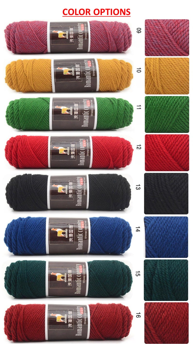 May include: A selection of yarn skeins in various colors, including red, green, blue, black, and yellow. The yarn is labeled "Romantic Country" and features a llama illustration. The skeins are arranged in rows with corresponding color swatches.