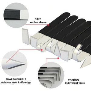 May include: A set of eight different tools with stainless steel knife-edge blades and black rubber sleeves. The tools have various shapes and sizes, including a pointed tip, a curved edge, and a straight edge. The tools are labeled "SAFE rubber sleeve" and "SHARP&DURBLE stainless steel knife-edge".