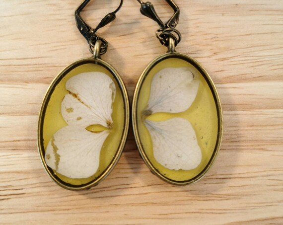 Nickel free antique bronze coloured dried flowers oval earrings