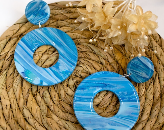 Big, donut, stud and drop earrings in the shades of blue
