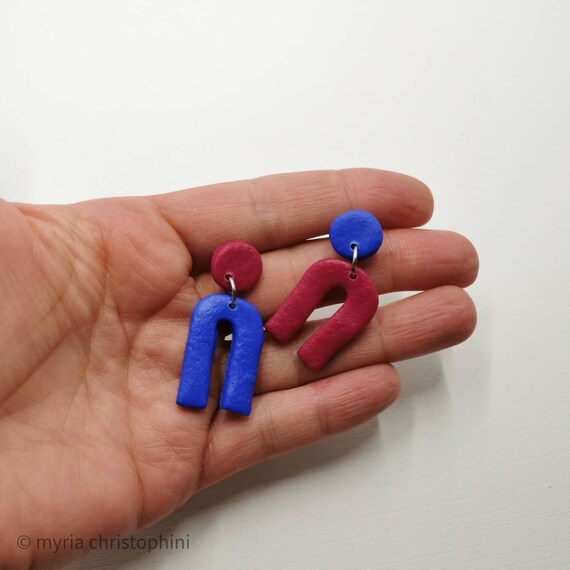 Blue and dark fuchsia, u earrings out of polymer clay that are nickel free