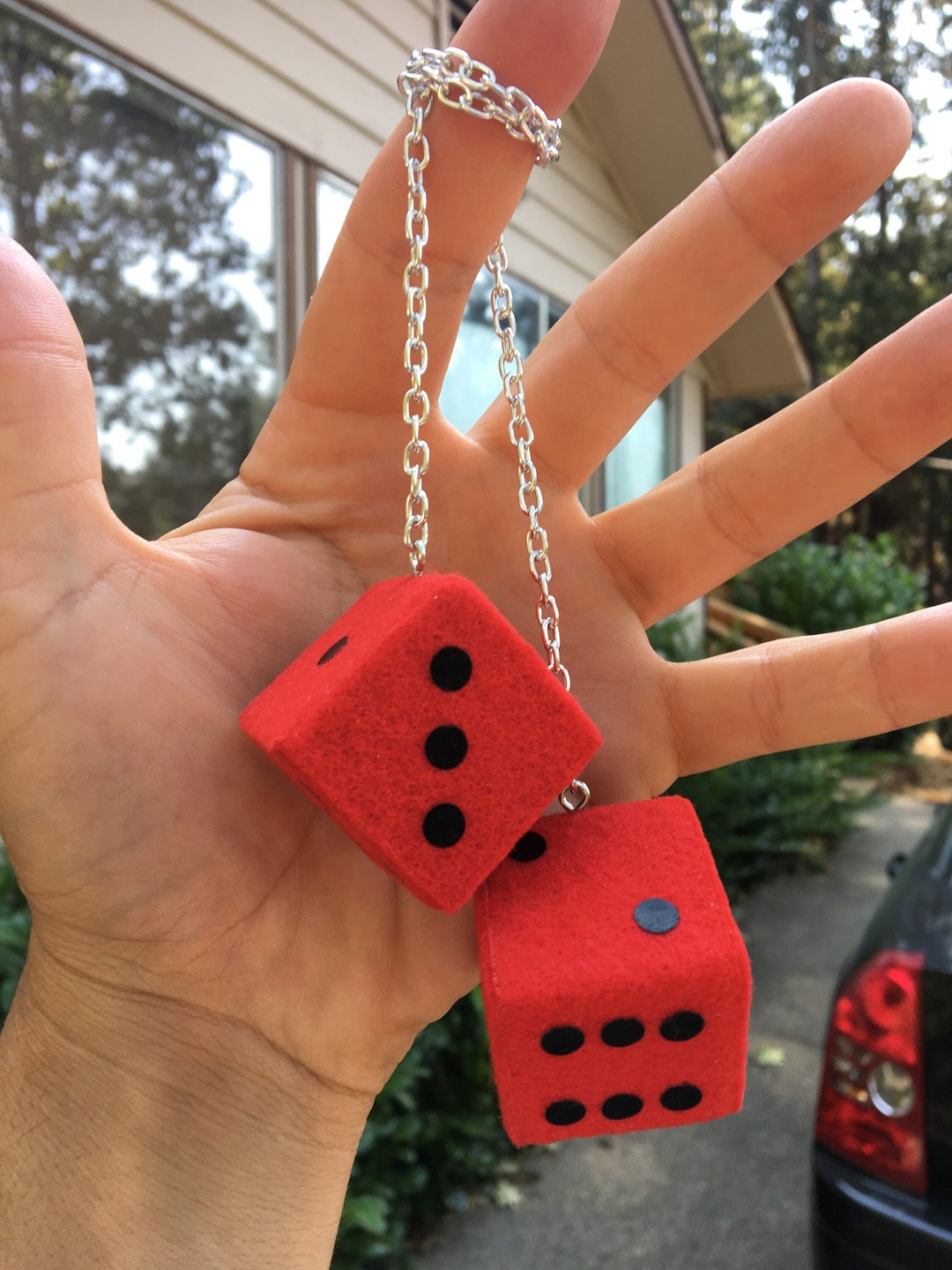 Red fuzzy dice with black dots discount