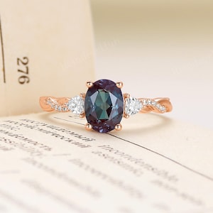 Oval Alexandrite Engagement Ring,14K Rose Gold Color Changing Alexandrite Ring For Women,Twisted Band Moissanite Ring,Unique Bridal Ring