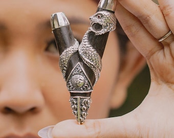 Balinese Traditional Technique Snake Kuripe, Handcrafted 99% Pure Silver, Dark Solid Wood, Garnet Stones on eye