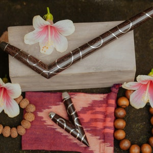 Wooden ceremonial pipe by Dewata Studio