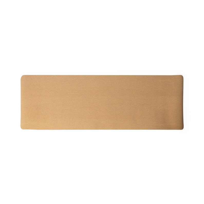 May include: A rectangular, tan-colored, textured object. The item has rounded corners and a slightly raised surface. The overall appearance is simple and neutral, with a consistent color tone throughout.