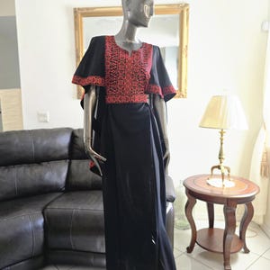 Modern Traditional Embroidered Palestinian Jordanian Black Dress Thobe Abaya Kaftan from the top with Tatreez Belt & a cape on the shoulders