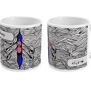 May include: White ceramic mug with a rowing boat design in blue and pink, set against a black and white wavy background. The mug has the text "Anthony" and "ARTISTE SAVANT" on it.