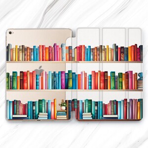 May include: A clear phone case with a colorful bookshelf design featuring rows of books with different colored spines. The case is designed to fit a tablet or phone.