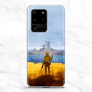 May include: A phone case with a watercolour illustration of a soldier on a yellow and blue shore, looking at a warship at sea. The soldier holds a rifle, with a blue sky and sea in the background.