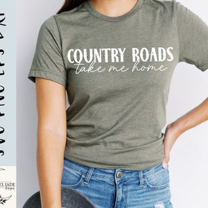 May include: A green t-shirt with the text "COUNTRY ROADS take me home" in white lettering.