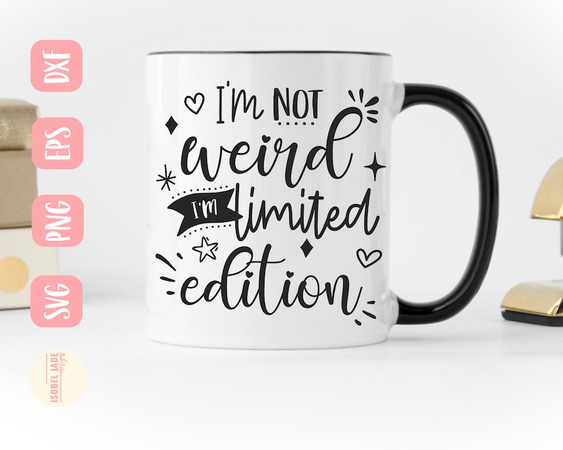 May include: White ceramic mug with a black handle. The mug has black text that reads "I'm not weird I'm limited edition" with a heart, star, and diamond graphic.