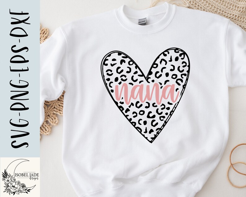 May include: White sweatshirt with a black and white leopard print heart design and the word "nana" in pink lettering.