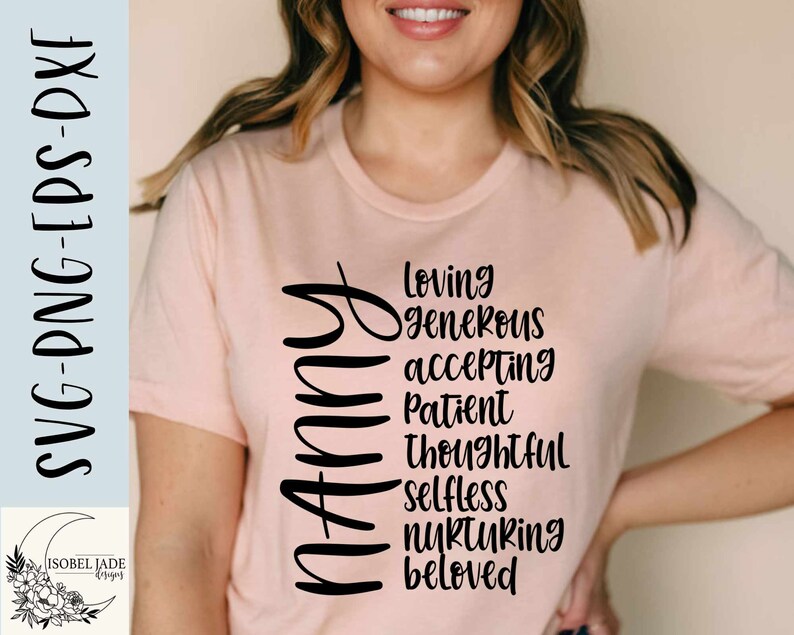 May include: A pink t-shirt with the word "Mommy" spelled vertically in black. The word is surrounded by a list of positive adjectives, including "loving", "generous", "accepting", "patient", "thoughtful", "selfless", "nurturing", and "beloved".