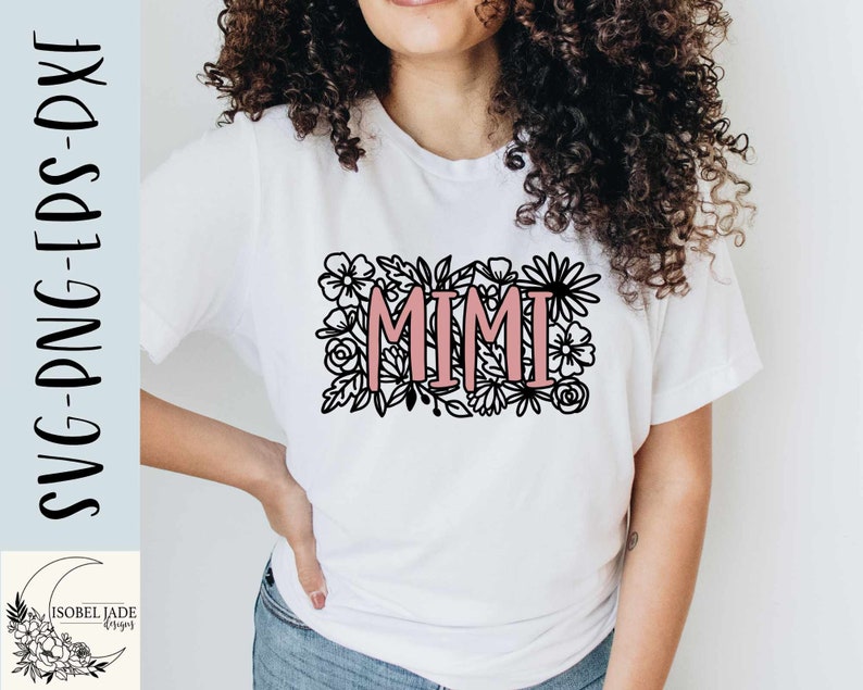 May include: A white t-shirt with a black floral design and the word "MIMI" in pink lettering.