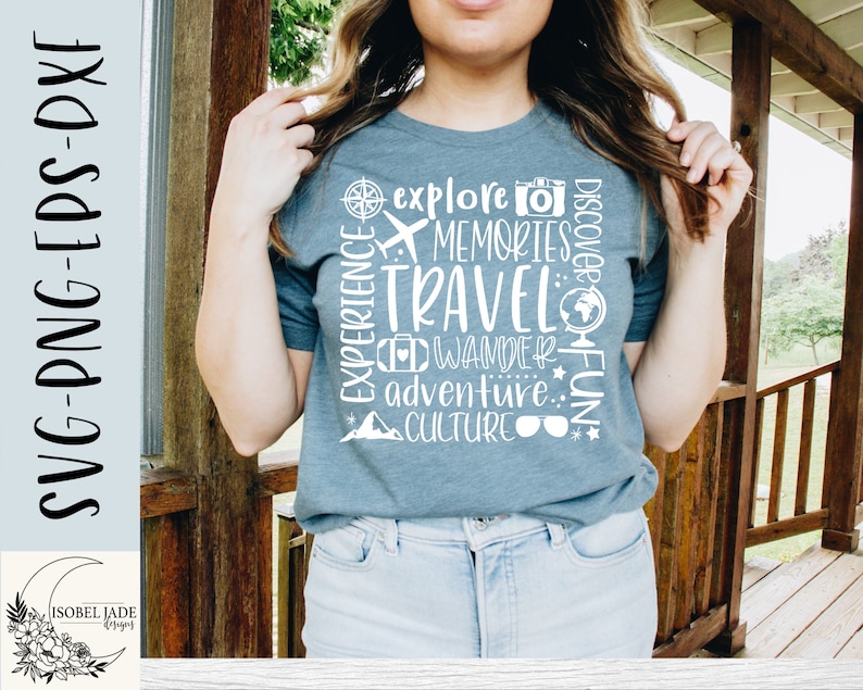 May include: A woman wearing a blue t-shirt with white text that says "Explore Memories Travel Wander Adventure Culture Discover Fun". The text is arranged in a circle around a compass, airplane, suitcase, globe, and sunglasses.