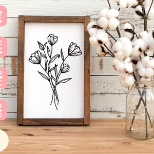 May include: A black and white line drawing of a bouquet of flowers in a simple, modern style. The flowers are stylised and have a delicate, feminine feel. The image is perfect for use in home decor, crafts, or digital design.