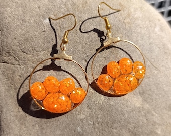 Solar Paws - Handmade orange epoxy resin earrings in paw shape