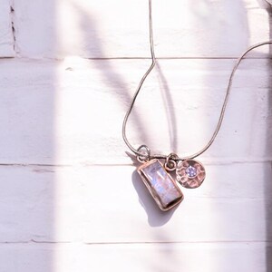 small cloud pendant with silver disc charm