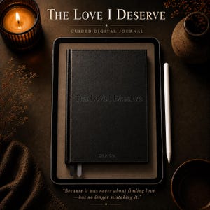 May include: A black journal with the embossed text "The Love I Deserve" sits on a tablet. A white stylus and a lit candle in a glass holder are next to the journal. The journal is a guided digital journal.