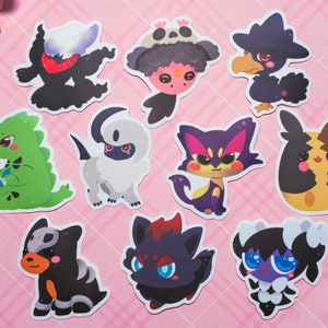 May include: A set of ten cartoon character stickers featuring various Pokemon characters. The stickers are printed on white paper and have a glossy finish. The characters include a black and white ghost-type Pokemon, a green lizard-type Pokemon, a black and white dog-type Pokemon, a black and red cat-type Pokemon, a black and yellow bird-type Pokemon, a black and white cat-type Pokemon, a black and white dog-type Pokemon, a black and red cat-type Pokemon, a black and white cat-type Pokemon, and a black and white cat-type Pokemon.