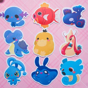 May include: Nine colorful cartoon stickers featuring various sea creatures. The stickers are on a pink and white checkered background. The stickers include a blue fish, a yellow duck, a pink and white seahorse, a blue turtle, a blue and white jellyfish, a blue and white seahorse, a blue and white crab, a red and white fish, and a blue and white octopus.