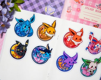 May include: Eight colorful stickers featuring different Pokemon characters in a bubble-like design. Each sticker has a different background color and features a different Pokemon character. The stickers are on a white background.