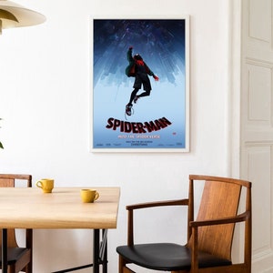 May include: A poster for the movie "Spider-Man: Into the Spider-Verse" featuring a cartoon image of Spider-Man swinging through the air in front of a cityscape.