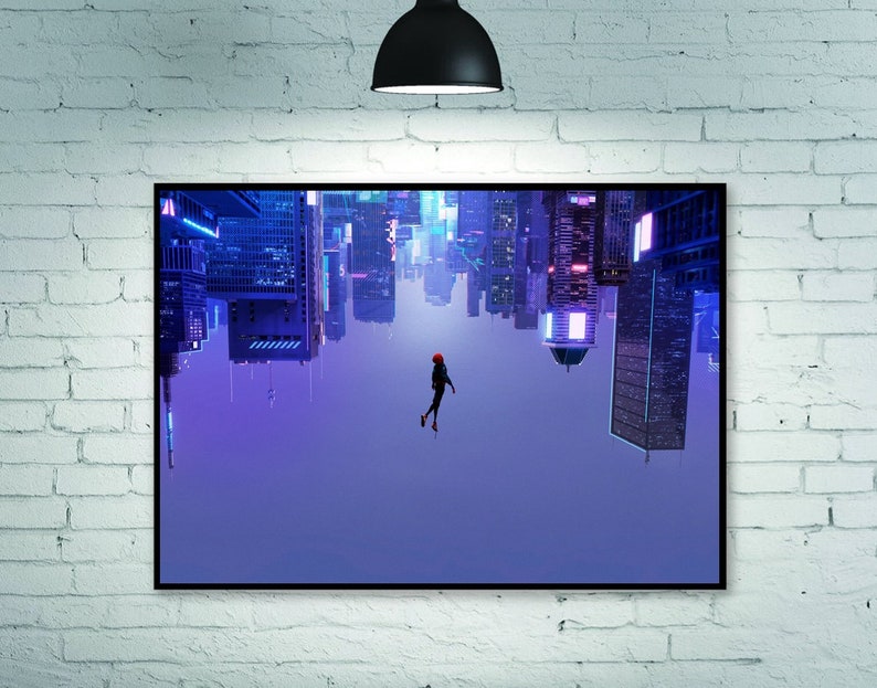 May include: A framed art print featuring a vibrant, upside-down cityscape with neon lights. A figure in a red jacket is suspended in the air. The artwork has a futuristic, comic book style, with a purple and blue color scheme.