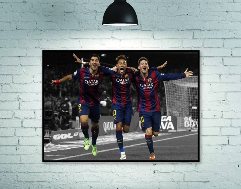 May include: Three soccer players in blue and red uniforms celebrate a goal. The players are wearing jerseys with the text "Qatar Airways" on the front. The background is a blurred image of a soccer field.