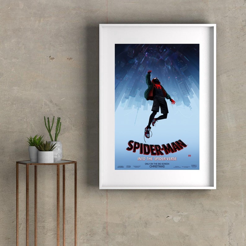 May include: A poster for the movie Spider-Man: Into the Spider-Verse. The poster features a red and black Spider-Man character in a superhero pose, against a backdrop of a city skyline and a starry night sky. The text "Spider-Man: Into the Spider-Verse" is displayed in white letters on a blue background.