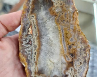 Kentucky moss agate with orange and grey banding, cut and unpolished