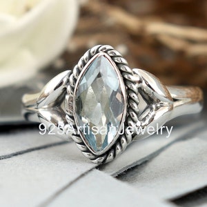 Handgemaakte sterlingzilveren ring met blauwe topaas: edelsteen marquise