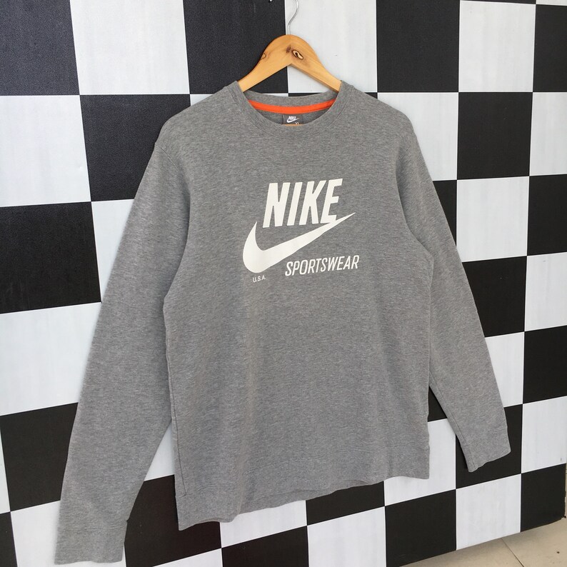 nike jumper logo in middle