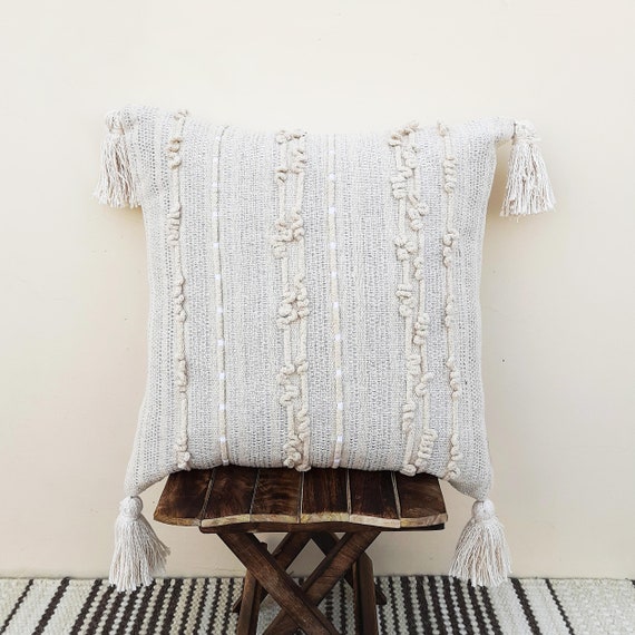 Cream colored top decorative pillows
