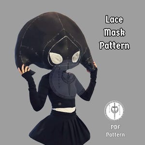 May include: A black lace mask pattern with white eye shapes and a hood. The text "Lace Mask Pattern" and "PDF Pattern" are visible. The mask is held up by a person wearing a black outfit.