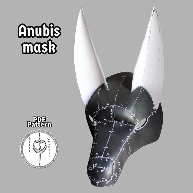 May include: A black Anubis mask with white ears. The mask is made of leather and has a pattern of lines and numbers on it. The text "Anubis mask" and "PDF Pattern" are visible in the image.