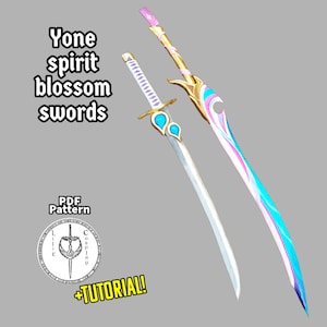May include: Two swords, one with a blue and white blade and a gold handle, the other with a pink and blue blade and a gold handle. The swords are called "Yone spirit blossom swords" and there is a PDF pattern and tutorial available.