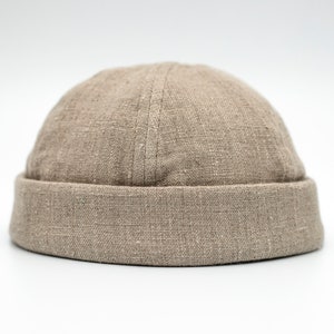 Handmade linen docker cap.