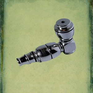 May include: A silver metal smoking pipe with a rounded bowl and a long, cylindrical stem.