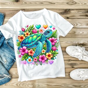 May include: White t-shirt featuring a colorful sea turtle design surrounded by flowers and hearts. The turtle is blue and green, with a floral arrangement of pink, yellow, and orange flowers. The text "Keep calm and boho on" is also visible.
