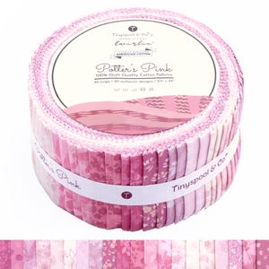 May include: A jelly roll of 40 fabric strips in various shades of pink, featuring floral and geometric patterns. The label reads Tinyspool & Co.'s Magnificent Twirlie, Potter's Pink, 100% Quilt Quality Cotton Fabrics, 40 strips / 20 authentic designs / 2.5" x 44".
