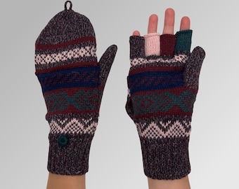 May include: A pair of fingerless gloves with a colorful geometric pattern in shades of pink, red, green, blue, and brown. The gloves are made of a soft, knitted fabric.